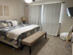 Master suite w/ king size bed ceiling & floor fan